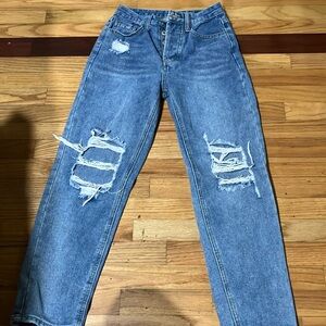Distressed Blue Jeans